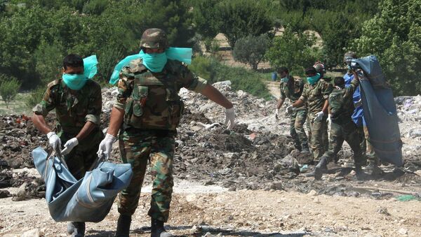 Fosses communes, corps mutilés, mines antipersonnel: le paysage d’Alep-Est libéré - Sputnik Afrique