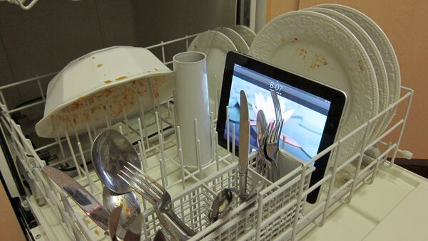 Un iPad dans un lave-vaisselle - Sputnik Afrique