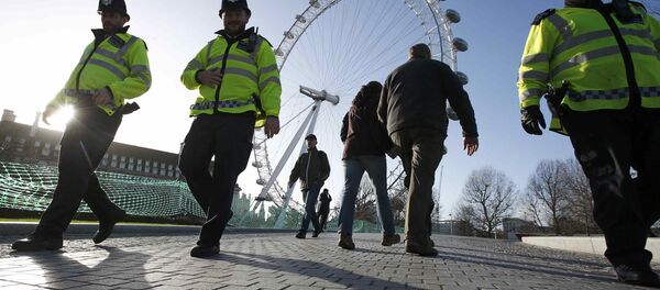 Police patrol near the London Eye before New Year's Eve celebrations in London - Sputnik Afrique