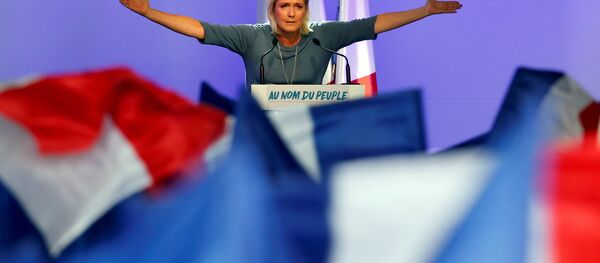 Marine Le Pen, French National Front (FN) political party leader, gestures during an FN political rally in Frejus Marine Le Pen, French National Front (FN) political party leader, gestures during an FN political rally in Frejus - Sputnik Afrique