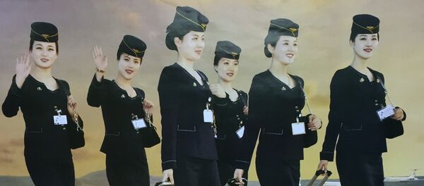 Les plus belles hôtesses de l'air nord-coréennes vous invitent à bord ! - Sputnik Afrique
