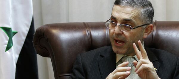 Syrian Reconciliation Minister Ali Haidar speaks during an interview with AFP in Damascus on February 11, 2014 - Sputnik Afrique