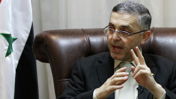 Syrian Reconciliation Minister Ali Haidar speaks during an interview with AFP in Damascus on February 11, 2014 - Sputnik Afrique