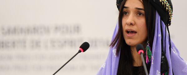 Nadia Murad , public advocates for the Yazidi community in Iraq and survivors of sexual enslavement by the Islamic State jihadists delivers a speech after being awarded co-laureate of the 2016 Sakharov human rights prize, on December 13, 2016 at the European parliament in Strasbourg Nadia Murad , public advocates for the Yazidi community in Iraq and survivors of sexual enslavement by the Islamic State jihadists delivers a speech after being awarded co-laureate of the 2016 Sakharov human rights prize, on December 13, 2016 at the European parliament in Strasbourg - Sputnik Afrique