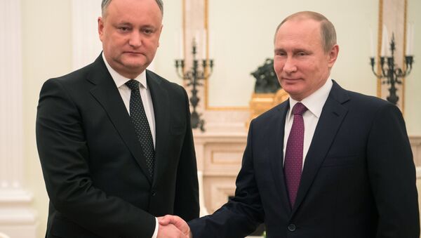Russian President Vladimir Putin and Moldova's President Igor Dodon meet in Moscow on January 17, 2017 - Sputnik Afrique