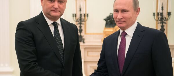 Russian President Vladimir Putin and Moldova's President Igor Dodon meet in Moscow on January 17, 2017 - Sputnik Afrique