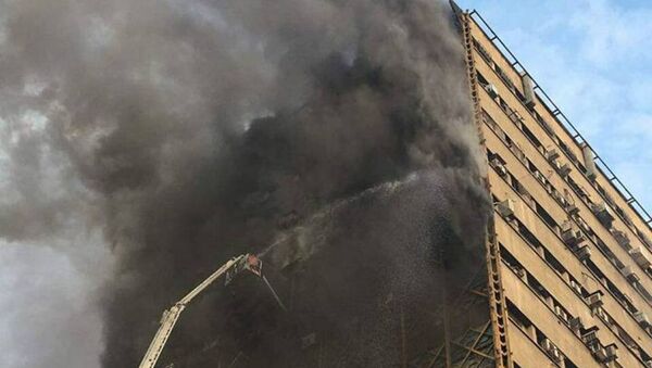Un immeuble de 15 étages s'effondre à Téhéran - Sputnik Afrique