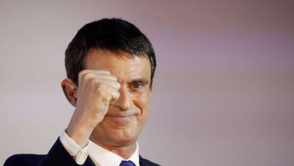Former French Prime Minister and candidate Manuel Valls reacts after the results in the first round of the French left's presidential primary election in Paris - Sputnik Afrique