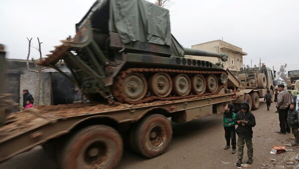 Turkish military vehicles drive in the northern Syrian rebel-held town of al-Rai, Syria January 5, 2017. - Sputnik Afrique