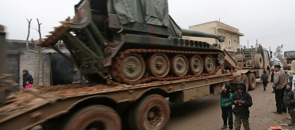 Turkish military vehicles drive in the northern Syrian rebel-held town of al-Rai, Syria January 5, 2017. - Sputnik Afrique