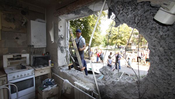 Un bâtiment de Iassinovataïa, dans le Donbass, endommagé par des tirs de l'armée ukrainienne - Sputnik Afrique