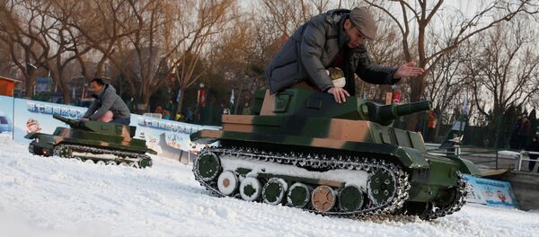 Des chars électroniques lors de la célébration du Nouvel an chinois à Pékin - Sputnik Afrique