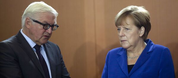 Frank-Walter Steinmeier et Angela Merkel - Sputnik Afrique