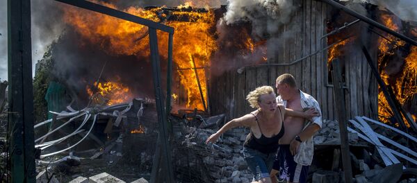 Sputnik gagne le prix de World Press Photo avec «Les jours noirs de l’Ukraine» Sputnik gagne le prix de World Press Photo avec «Les jours noirs de l’Ukraine» - Sputnik Afrique