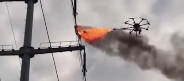Fire-spewing drones burn excess plastic down from electrical wires - Sputnik Afrique