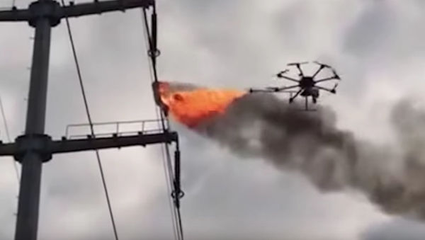 Fire-spewing drones burn excess plastic down from electrical wires - Sputnik Afrique