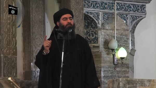 This July 5, 2014 photo shows an image grab taken from a propaganda video released by al-Furqan Media allegedly showing the leader of the Islamic State (IS) jihadist group, Abu Bakr al-Baghdadi, aka Caliph Ibrahim, adressing Muslim worshippers at a mosque in the militant-held northern Iraqi city of Mosul - Sputnik Afrique