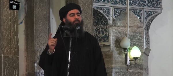 This July 5, 2014 photo shows an image grab taken from a propaganda video released by al-Furqan Media allegedly showing the leader of the Islamic State (IS) jihadist group, Abu Bakr al-Baghdadi, aka Caliph Ibrahim, adressing Muslim worshippers at a mosque in the militant-held northern Iraqi city of Mosul - Sputnik Afrique