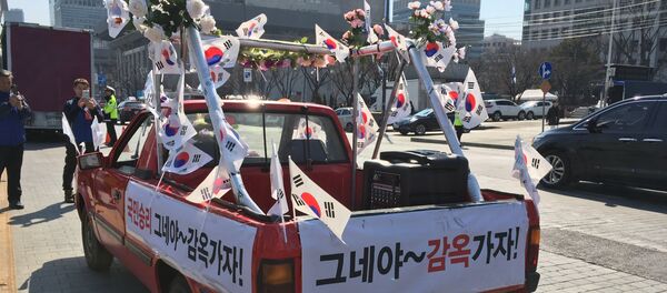 Les Coréens du Sud entre paradis et enfer après la destitution de leur présidente Les Coréens du Sud entre paradis et enfer après la destitution de leur présidente - Sputnik Afrique