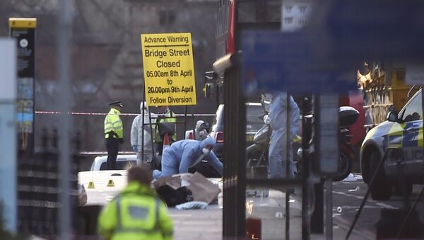Forensics investigators work at the scene after an attack on Westminster Bridge in London, Britain March 22, 2017. - Sputnik Afrique