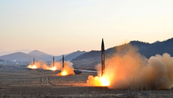 North Korean leader Kim Jong Un supervised a ballistic rocket launching drill of Hwasong artillery units of the Strategic Force of the KPA on the spot in this undated photo released by North Korea's Korean Central News Agency (KCNA) in Pyongyang March 7, 2017. - Sputnik Afrique