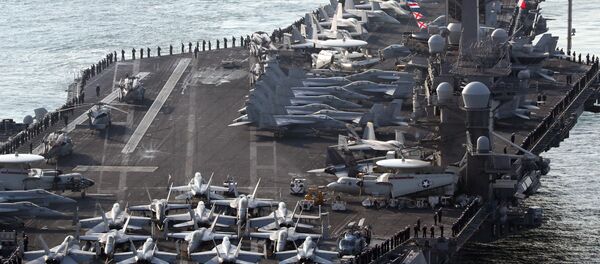 U.S. aircraft carrier USS Carl Vinson arrives for an annual joint military exercise called Foal Eagle between South Korea and U.S, at the port of Busan, South Korea, March 15, 2017. - Sputnik Afrique