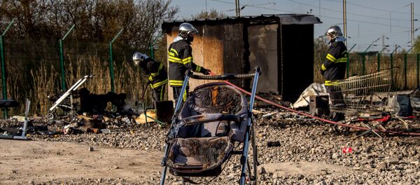 Incendie dans un camp des réfugiés à Grande-Synthe - Sputnik Afrique