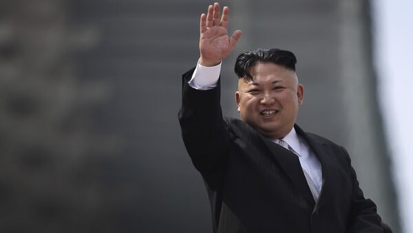 North Korean leader Kim Jong Un waves during a military parade on Saturday, April 15, 2017, in Pyongyang, North Korea to celebrate the 105th birth anniversary of Kim Il Sung, the country's late founder and grandfather of current ruler Kim Jong Un. - Sputnik Afrique