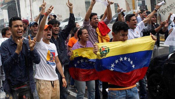 Des manifestants au Venezuela - Sputnik Afrique