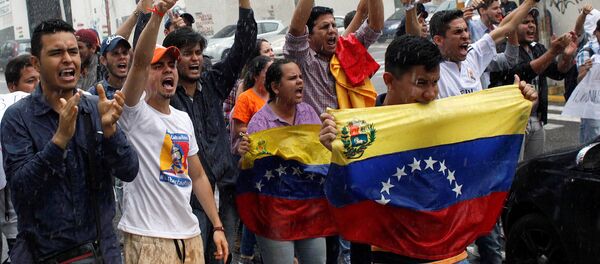 Des manifestants au Venezuela - Sputnik Afrique