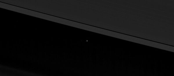 Comment voit-on la Terre et la Lune depuis l'orbite de Saturne? - Sputnik Afrique