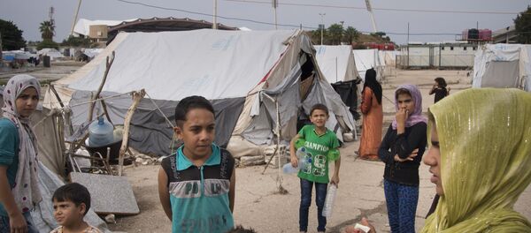 Un camp de réfugiés syriens à Lattaquié (archives) - Sputnik Afrique