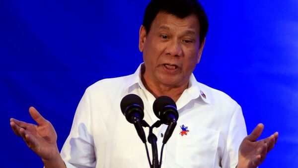 Philippine President Rodrigo Duterte gestures while delivering a speech during the 80th National Bureau of Investigation (NBI) founding anniversary at the NBI headquarters in metro Manila - Sputnik Afrique