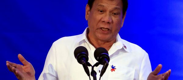 Philippine President Rodrigo Duterte gestures while delivering a speech during the 80th National Bureau of Investigation (NBI) founding anniversary at the NBI headquarters in metro Manila - Sputnik Afrique