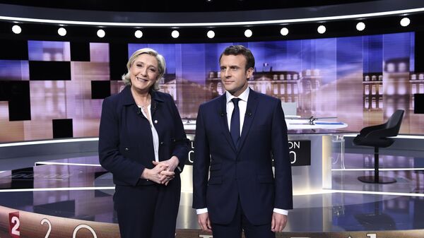 Emmanuel Macron et Marine Le Pen lors du débat télévisé de l'entre-deux-tours, le 3 mai 2017 - Sputnik Afrique