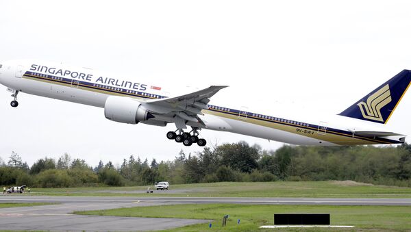Un Boeing 777 de Singapore Airlines (image d'illustration) - Sputnik Afrique