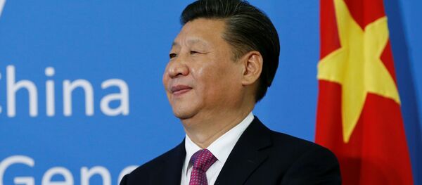 Chinese President Xi Jinping watches during a gift handover ceremony at the United Nations European headquarters in Geneva, Switzerland, January 18, 2017 - Sputnik Afrique