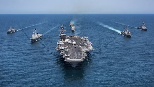 In this image released by the U.S. Navy, the aircraft carrier USS Carl Vinson, flanked by South Korean destroyers, from left, Yang Manchun and Sejong the Great, and the U.S.Navy's Wayne E. Meyer and USS Michael Murphy, transit the western Pacific Ocean Wednesday, May 3, 2017. - Sputnik Afrique