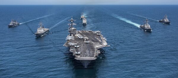 In this image released by the U.S. Navy, the aircraft carrier USS Carl Vinson, flanked by South Korean destroyers, from left, Yang Manchun and Sejong the Great, and the U.S.Navy's Wayne E. Meyer and USS Michael Murphy, transit the western Pacific Ocean Wednesday, May 3, 2017. - Sputnik Afrique