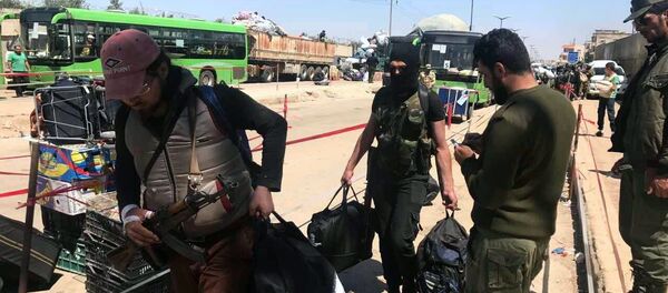 Retrait des combattants de Homs - Sputnik Afrique