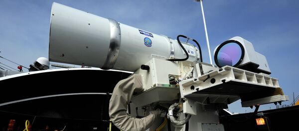 The Laser Weapon System (LaWS) temporarily installed aboard the guided-missile destroyer USS Dewey (DDG 105) in San Diego The Laser Weapon System (LaWS) temporarily installed aboard the guided-missile destroyer USS Dewey (DDG 105) in San Diego - Sputnik Afrique