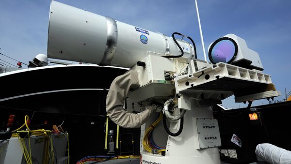 The Laser Weapon System (LaWS) temporarily installed aboard the guided-missile destroyer USS Dewey (DDG 105) in San Diego - Sputnik Afrique
