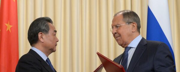 le ministre russe des Affaires étrangères Sergueï Lavrov et son homologue chinois Wang Yi - Sputnik Afrique