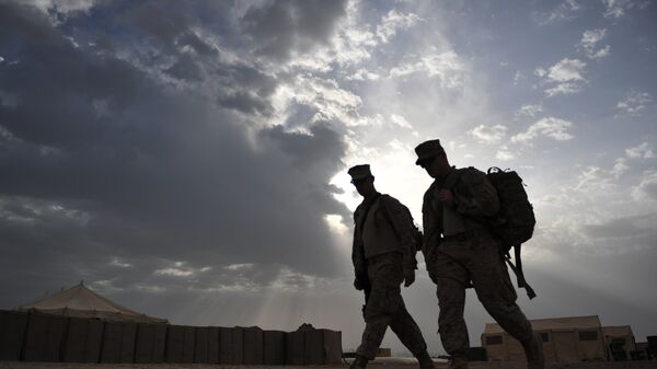 US Marines from 2nd Marine 8 Battalion (2/8) take an early morning walk at Camp Hansen, in Marjah, Helman Province, on May 4, 2011. - Sputnik Afrique