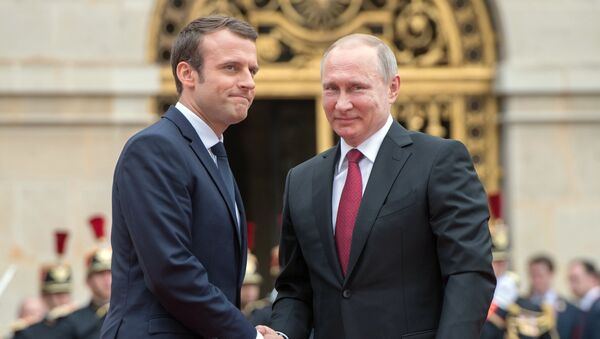 Macron et Poutine - Sputnik Afrique