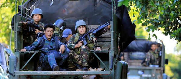 Les militaires philippins à Marawi Les militaires philippins à Marawi - Sputnik Afrique