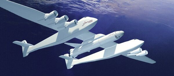 Artist's depiction of Stratolauch carrier at apogee, just before launching spacecraft (center vehicle) into orbit. - Sputnik Afrique