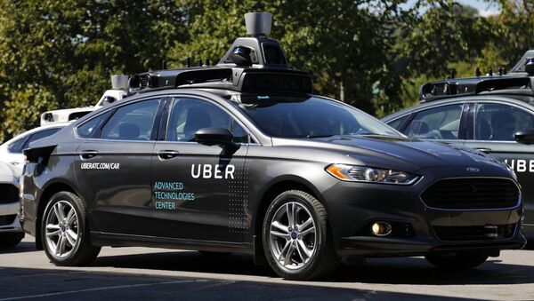A group of self driving Uber vehicles position themselves to take journalists on rides during a media preview at Uber's Advanced Technologies Center in Pittsburgh, Monday, Sept. 12, 2016. - Sputnik Afrique