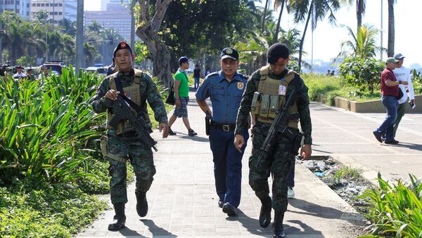 Members of the Philippine National Police (PNP) Special Action Force patrol after an Improvised Explosive Device (IED) was found near the U.S Embassy in metro Manila, Philippines November 28, 2016. - Sputnik Afrique