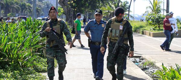 Members of the Philippine National Police (PNP) Special Action Force patrol after an Improvised Explosive Device (IED) was found near the U.S Embassy in metro Manila, Philippines November 28, 2016. Members of the Philippine National Police (PNP) Special Action Force patrol after an Improvised Explosive Device (IED) was found near the U.S Embassy in metro Manila, Philippines November 28, 2016. - Sputnik Afrique